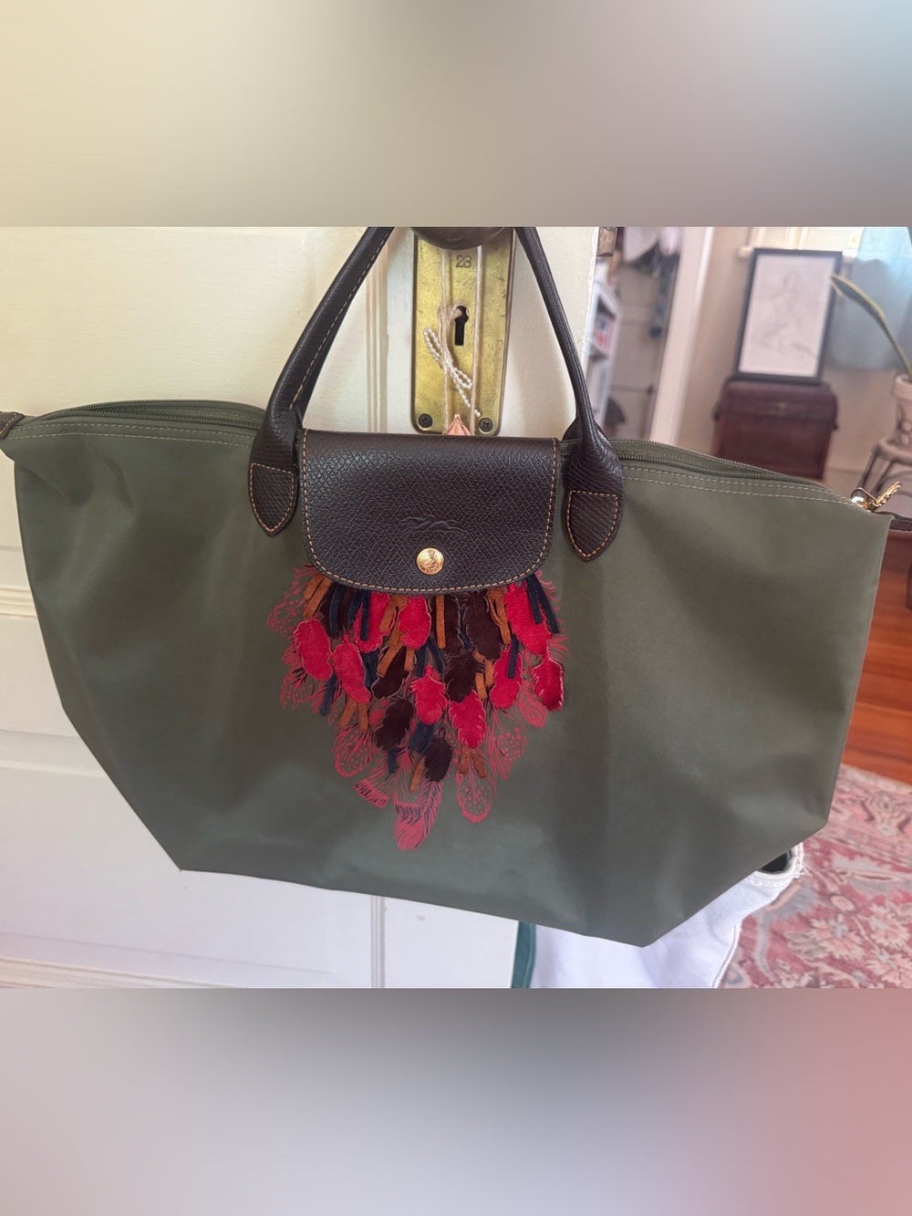 Longchamp Olive Tote with Black Trim and Red Feather Detail